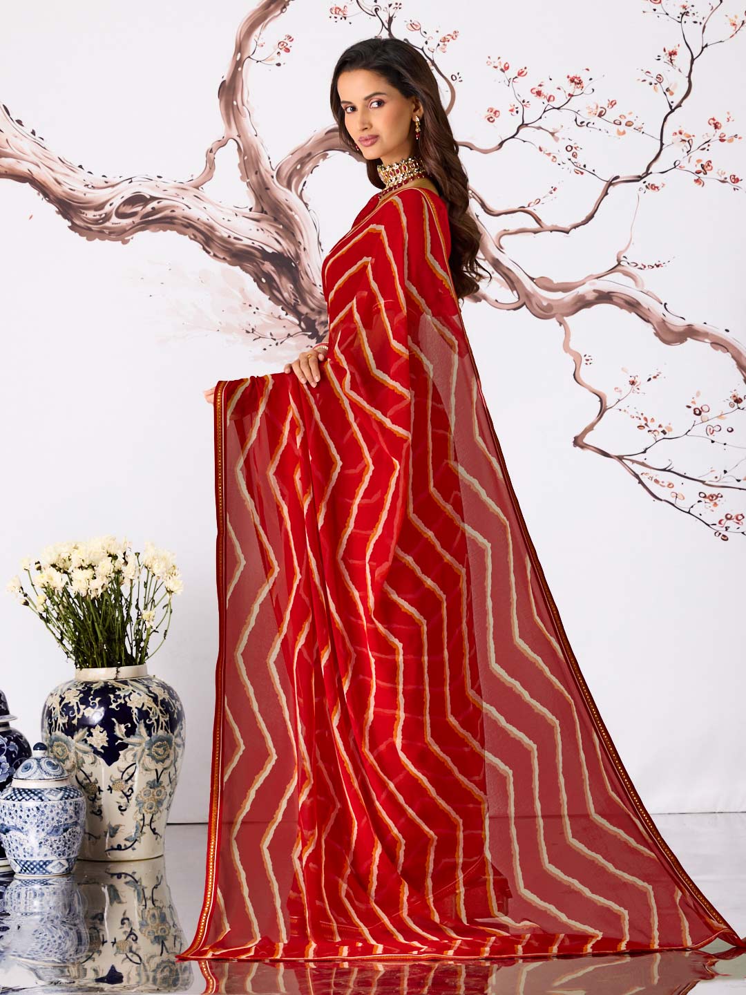 Red leheriya printed georgette saree party wear