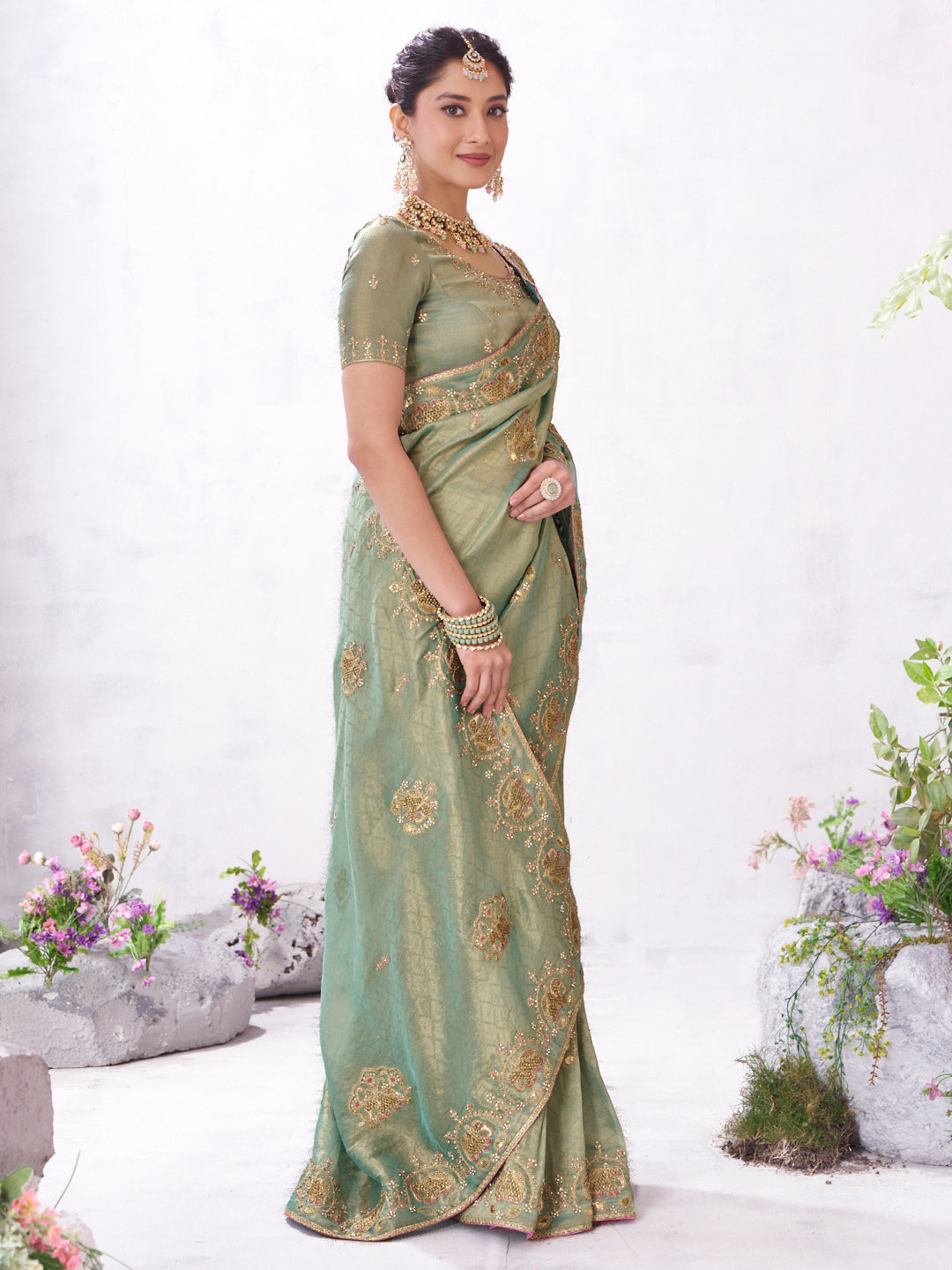Green embroidered saree elegant look