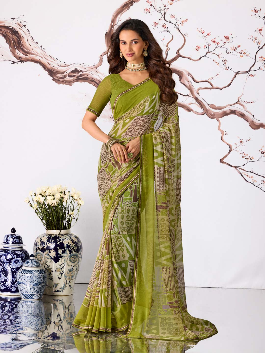 Green embellished georgette saree party wear