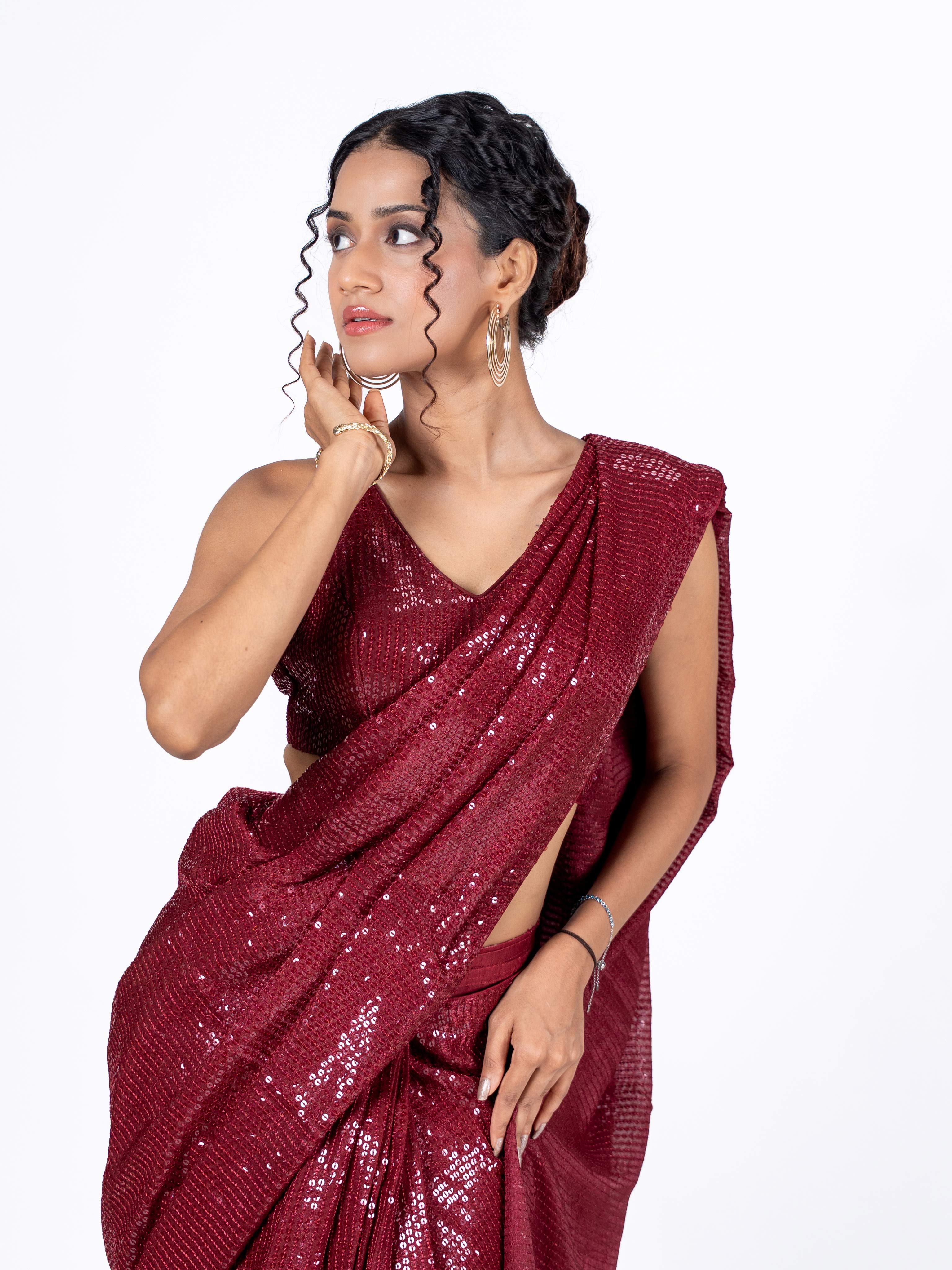 Maroon sequin embroidered georgette saree wedding wear