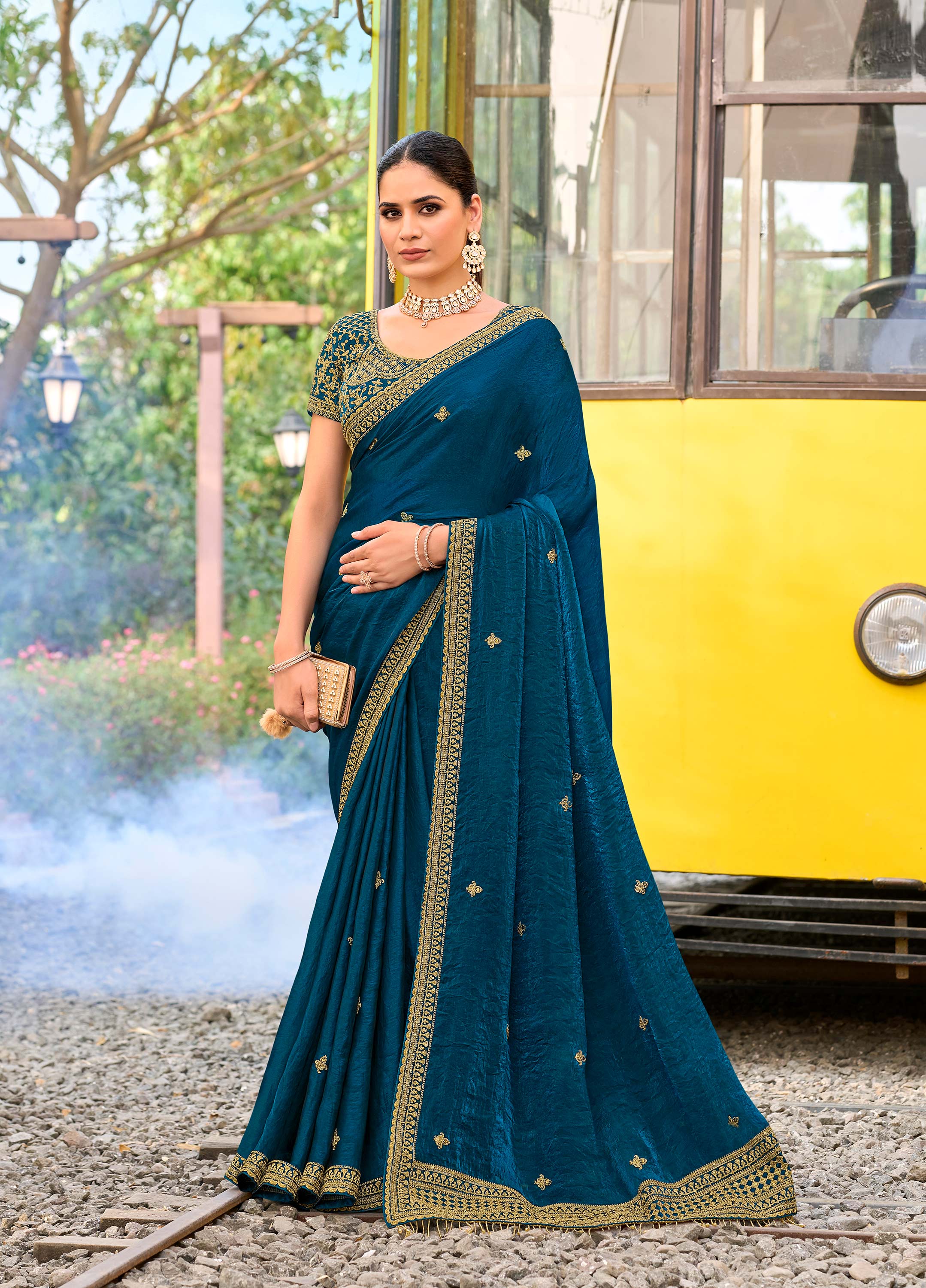 Blue silk blend embroidered border saree