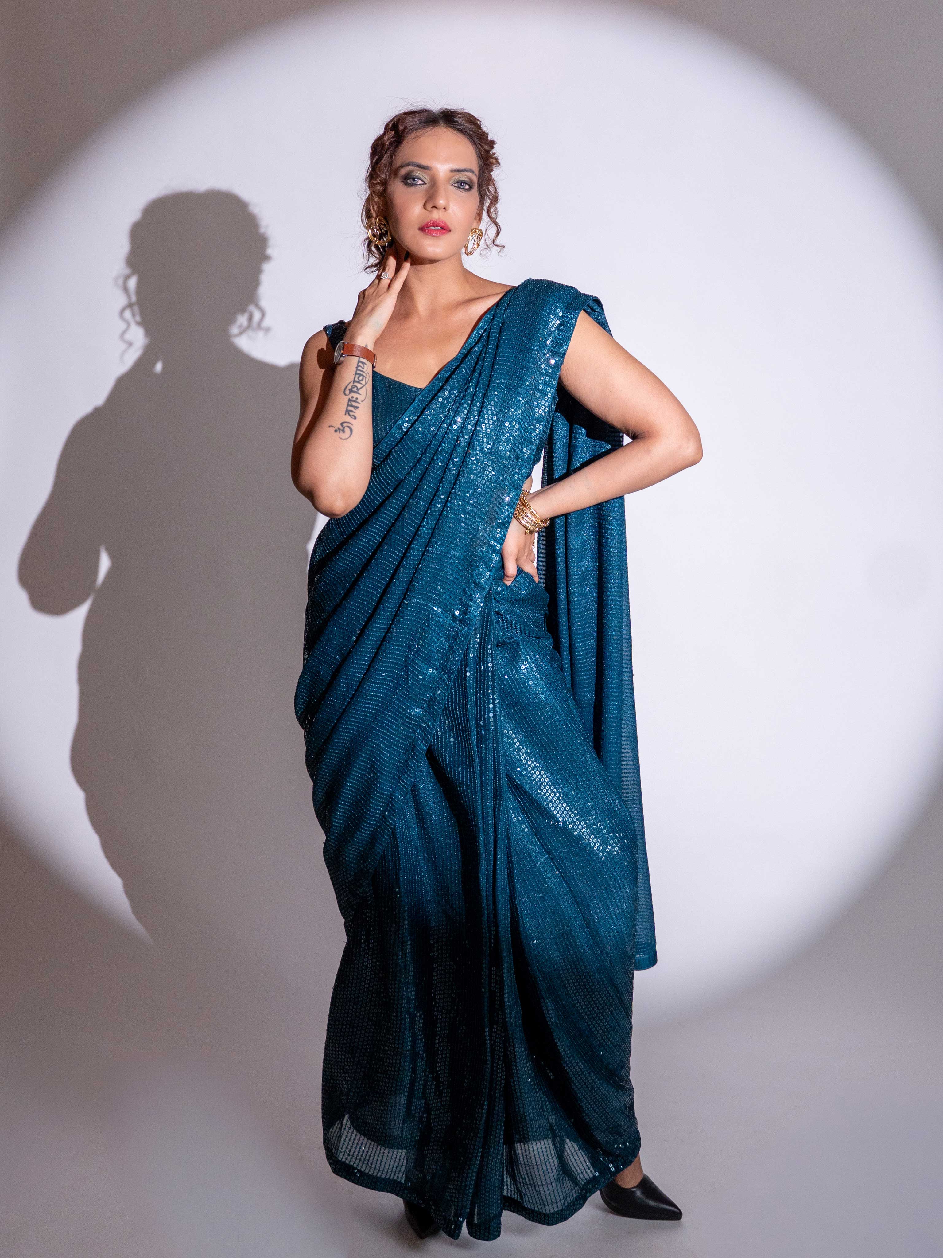 Blue sequin embroidered georgette saree wedding wear