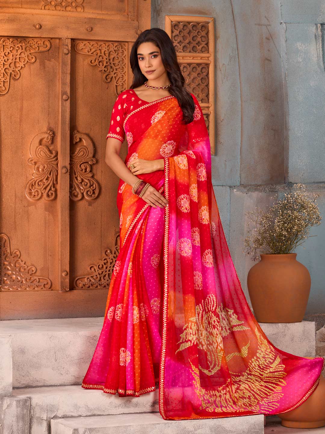 Red bandhani printed chiffon saree festive wear