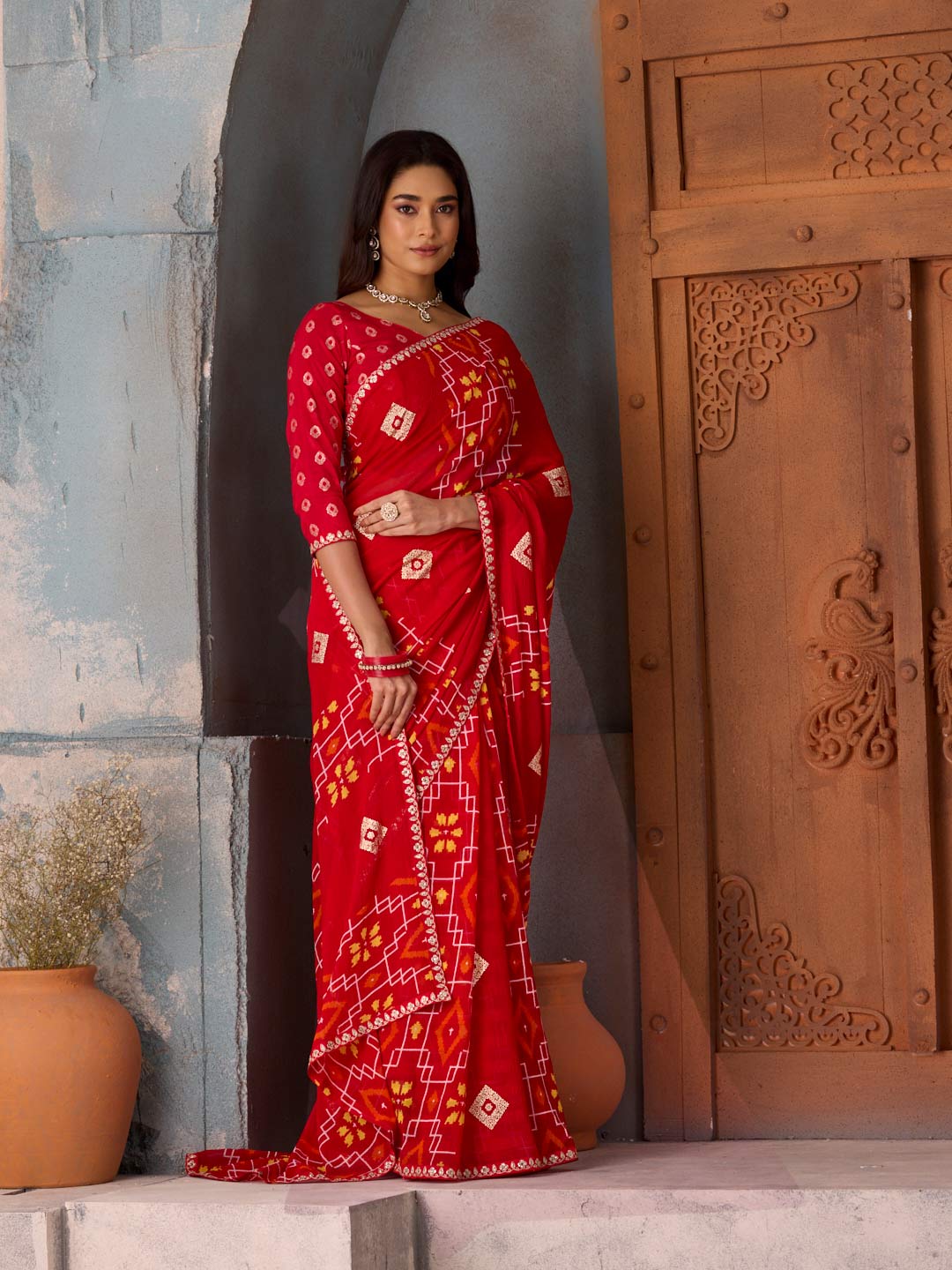 Red geometric printed georgette saree casual wear