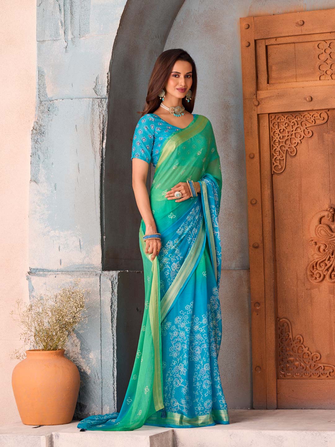 Blue floral printed chiffon saree wedding wear