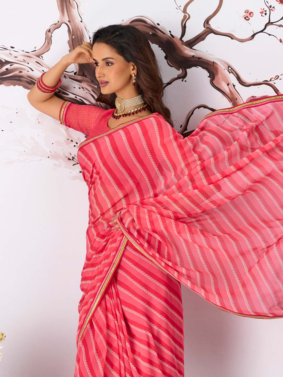 Pink striped georgette saree wedding wear