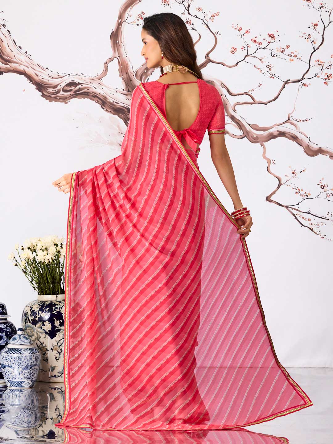 Pink striped georgette saree casual wear