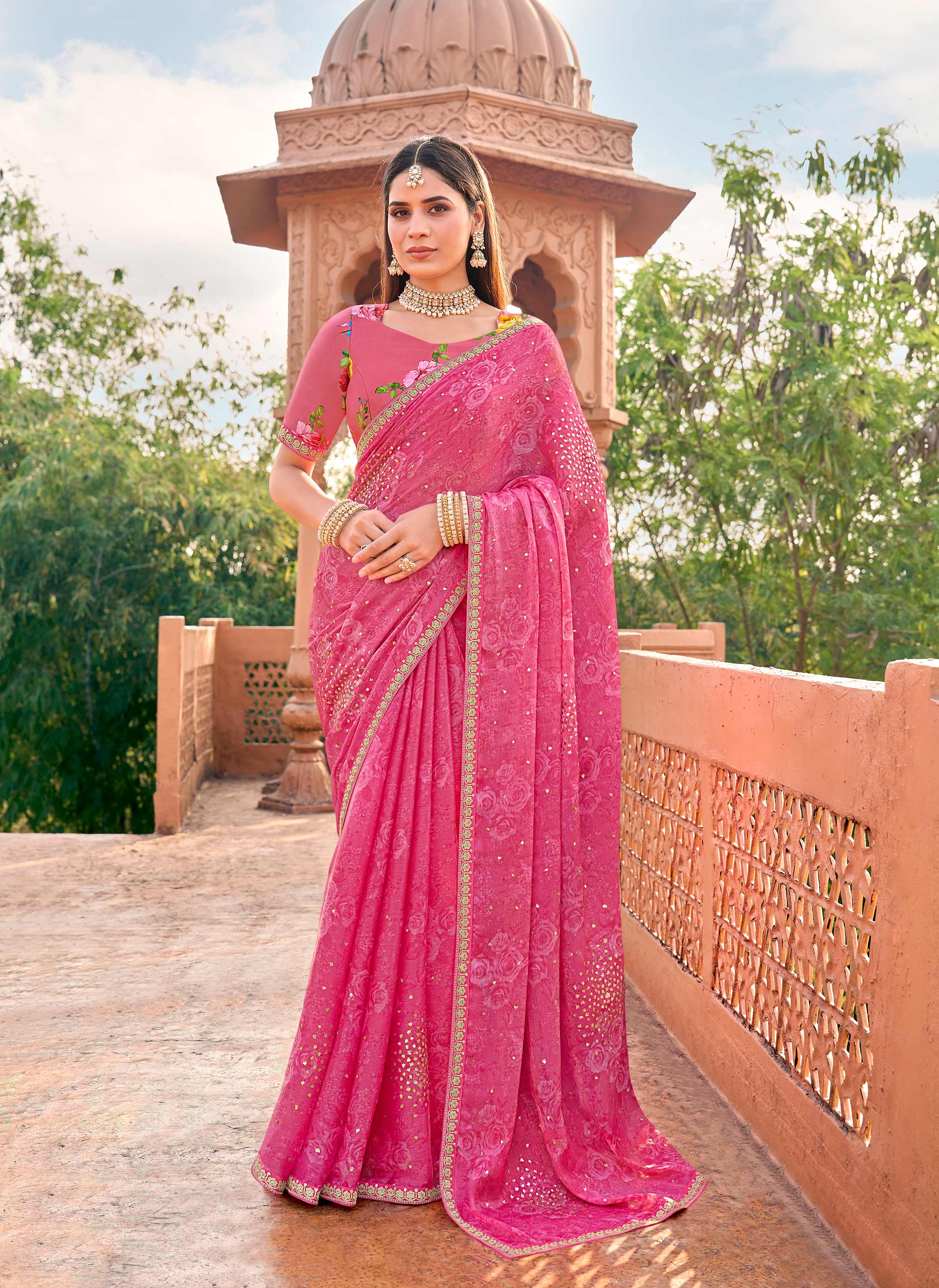Pink chiffon floral print saree with sequin motifs