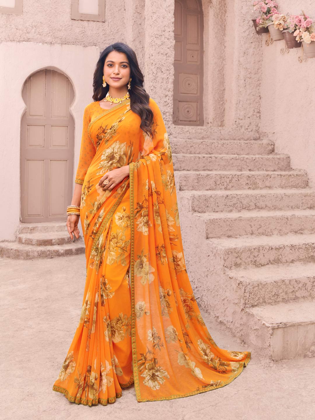 Orange georgette floral print saree
