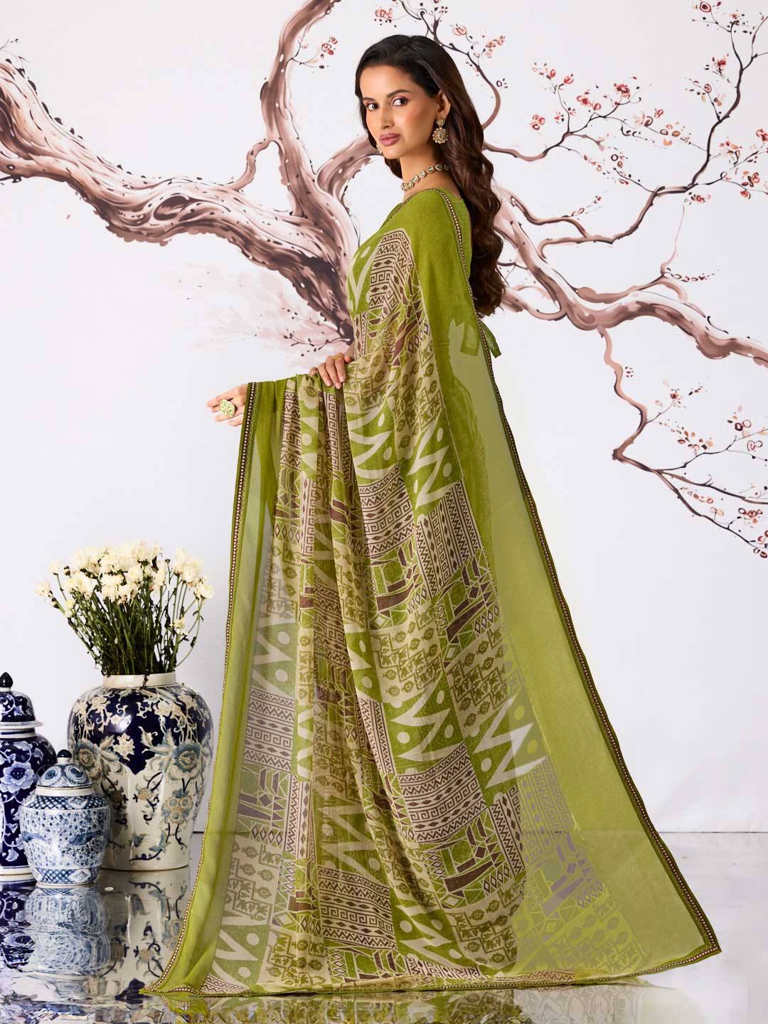 Green abstract printed georgette saree party wear