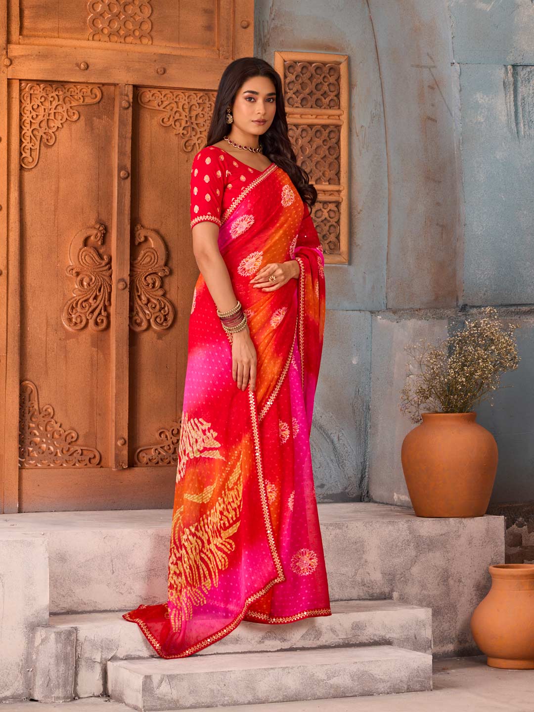 Red floral printed chiffon saree party wear