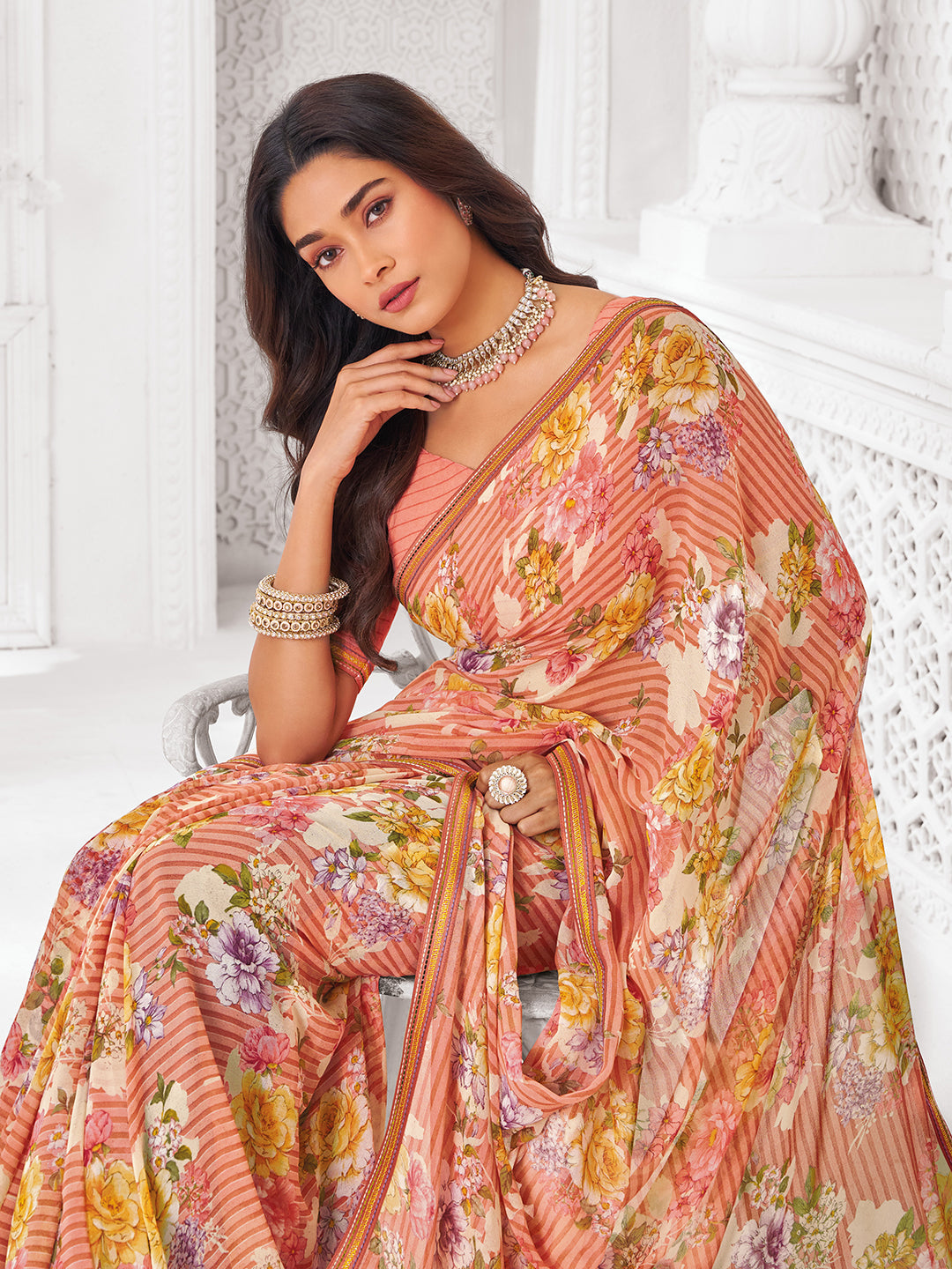 Laxmipati Kamya Orange Georgette Floral Printed Saree