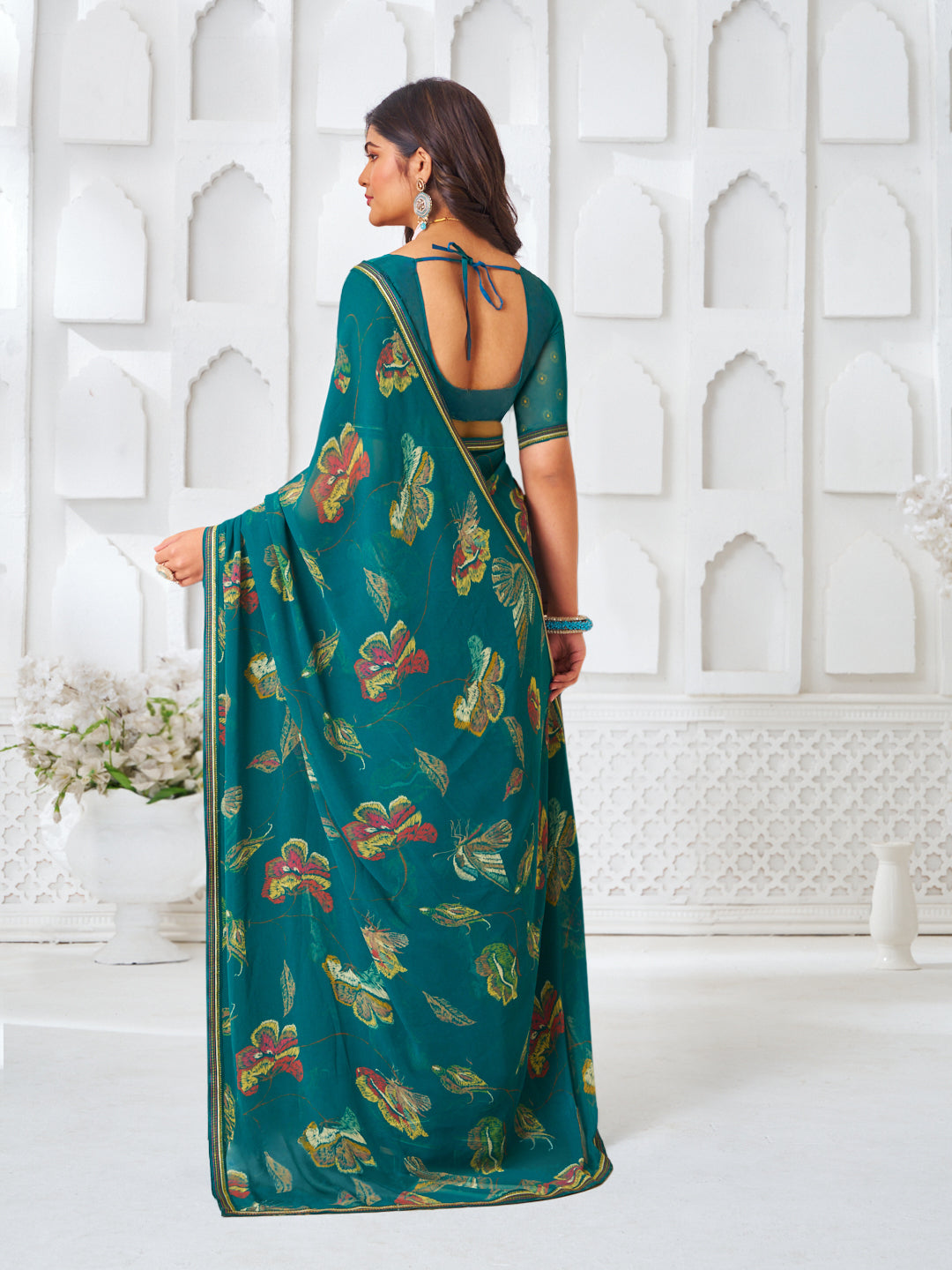 Laxmipati Kamya Teal Green Georgette Floral Printed Saree
