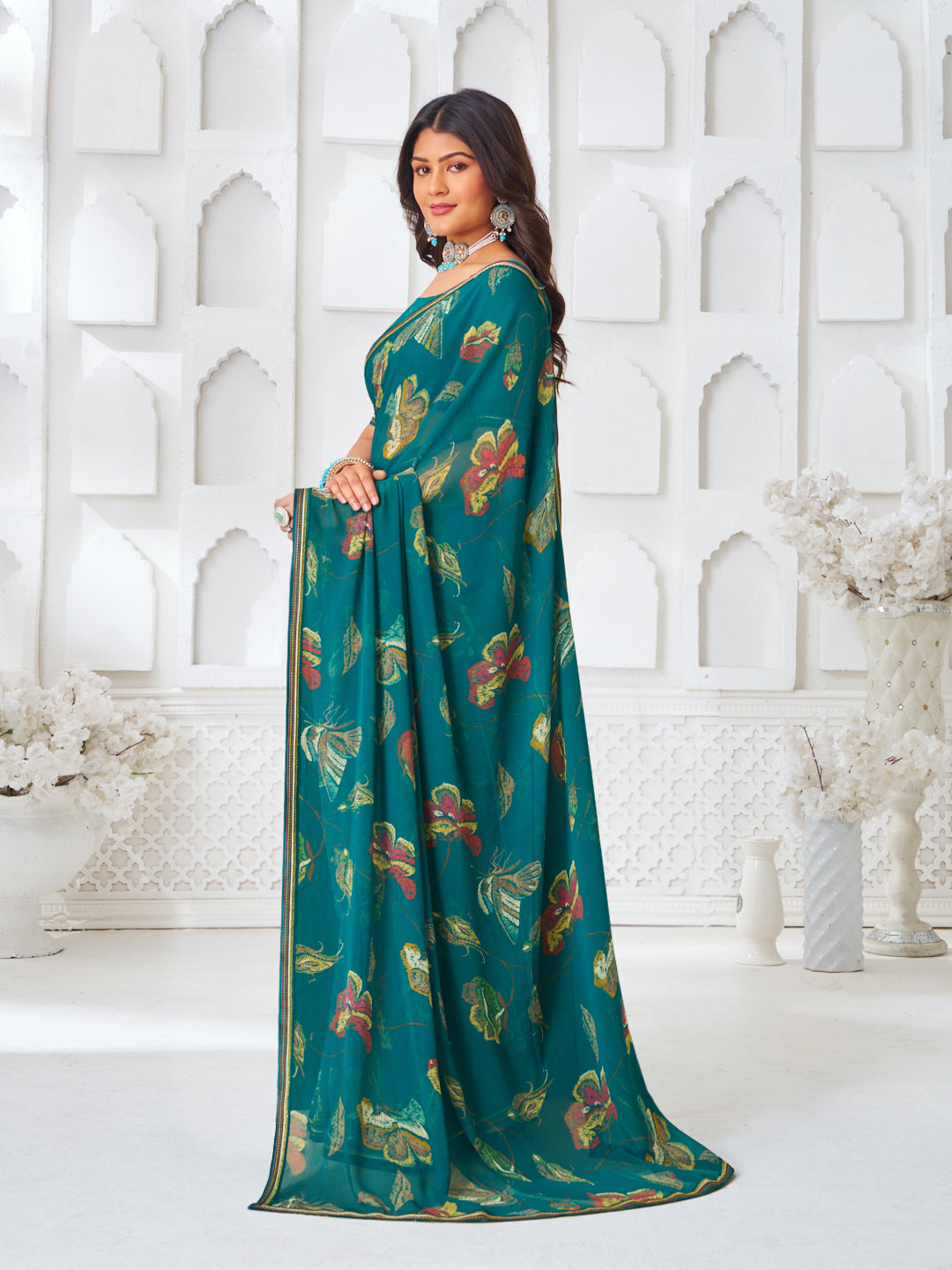 Laxmipati Kamya Teal Green Georgette Floral Printed Saree