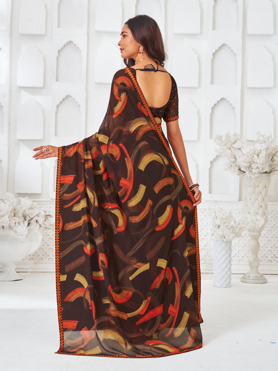 Laxmipati Kamya Brown Georgette Abstract Printed Saree