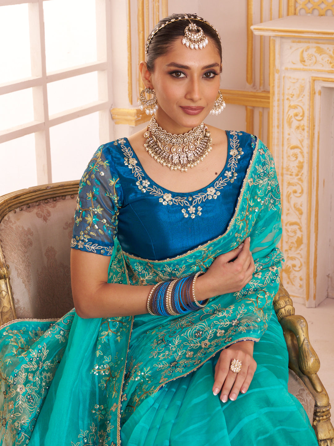 Laxmipati Chakor Teal Blue Tissue Organza Saree with Floral Embroidery