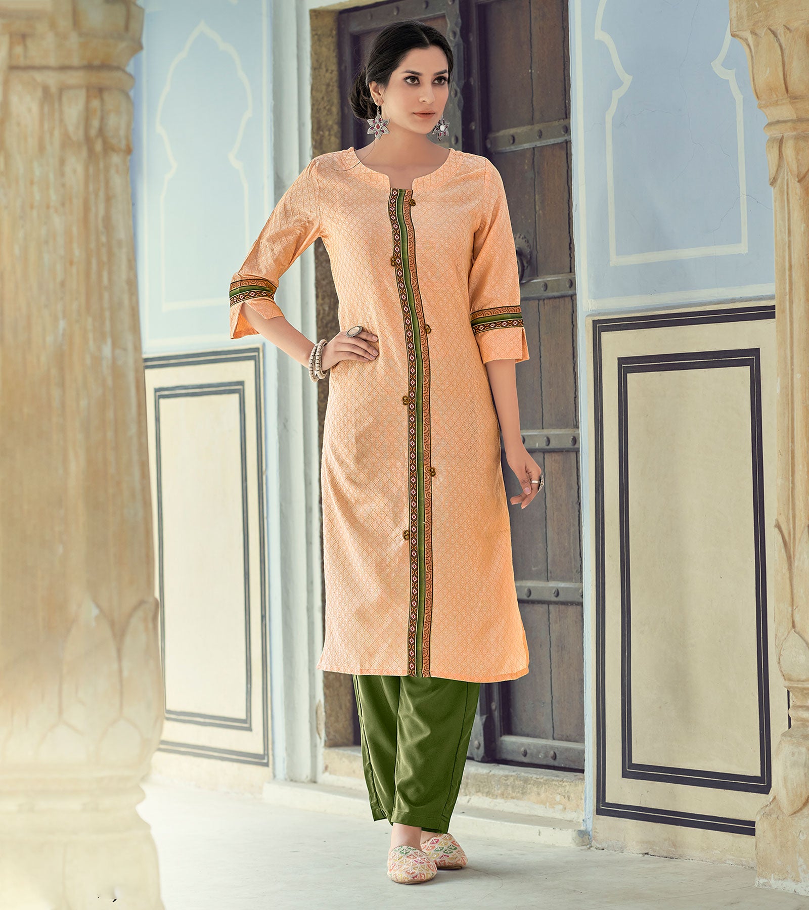 Laxmipati Nylon Viscose Dobby Pumpkin Peach Straight Cut Kurti