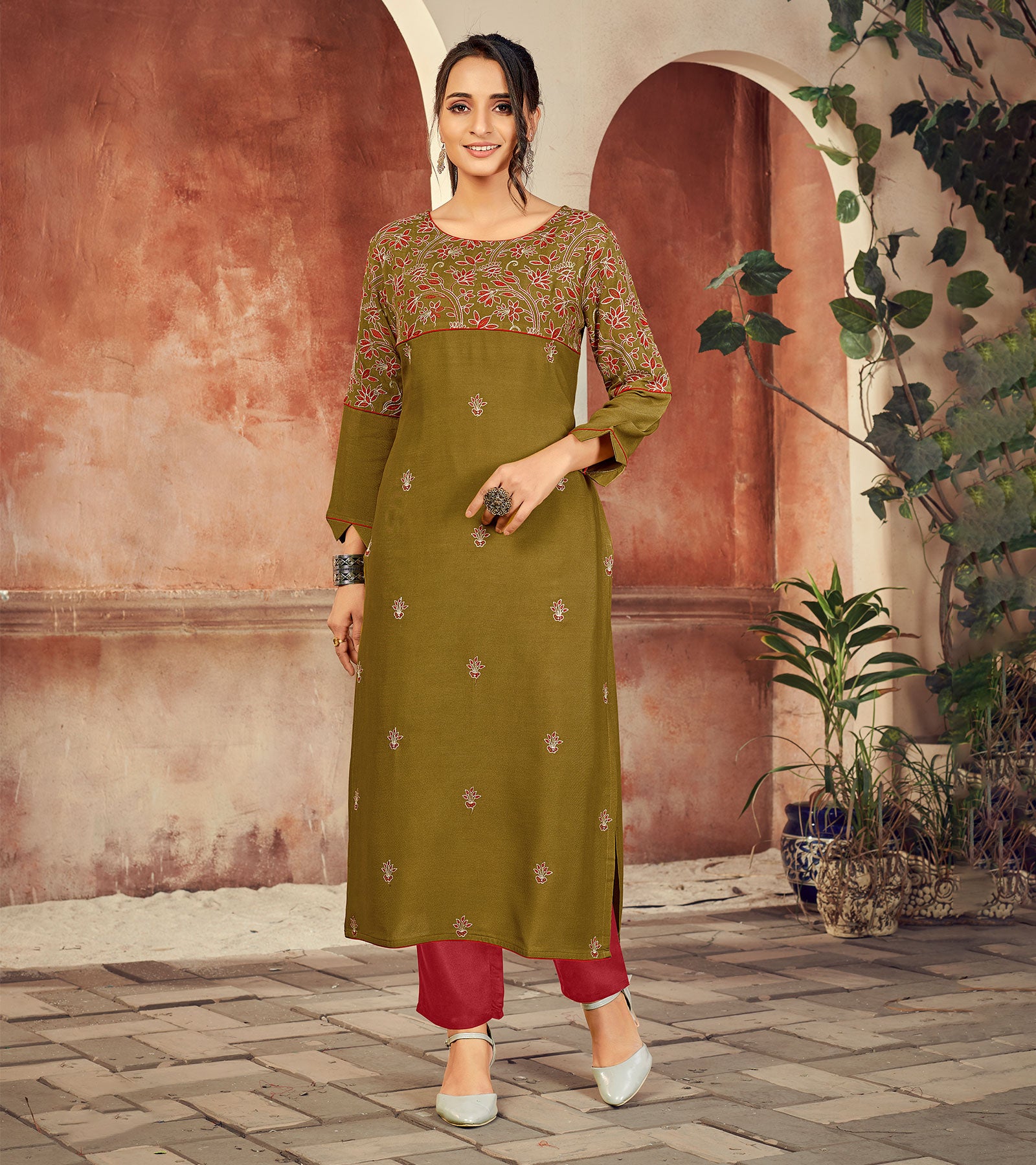 Laxmipati Rayon Mehendi Green Straight Cut Kurti Has Round Neck Variation , Embroidered Cufe & Different Yoke Pattern