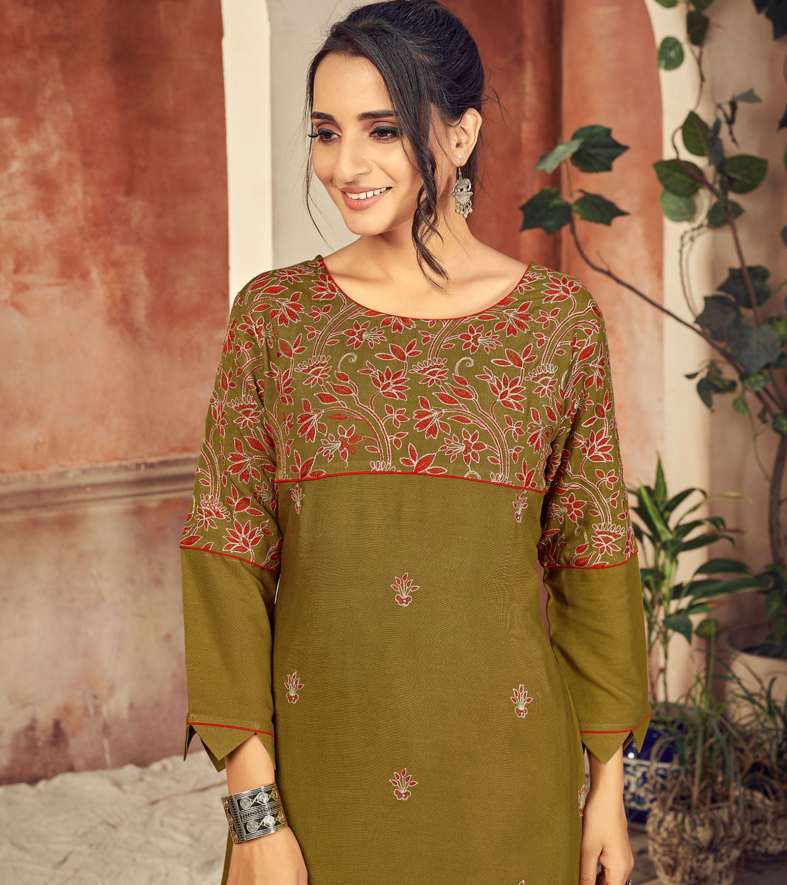 Laxmipati Rayon Mehendi Green Straight Cut Kurti Has Round Neck Variation , Embroidered Cufe & Different Yoke Pattern