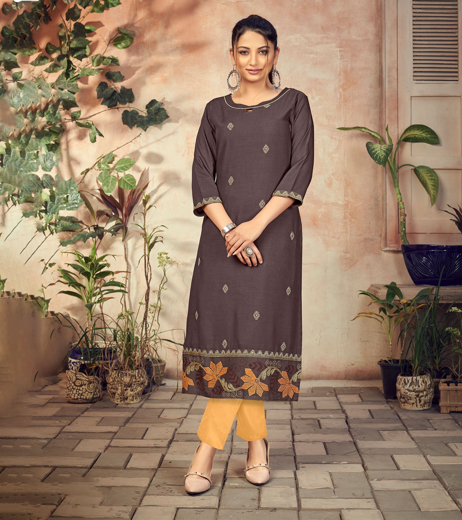 Laxmipati Rayon Charcoal Brown Straight Cut Kurti Has Round Neck Variation , Embroidered Cufe & Different Yoke Pattern