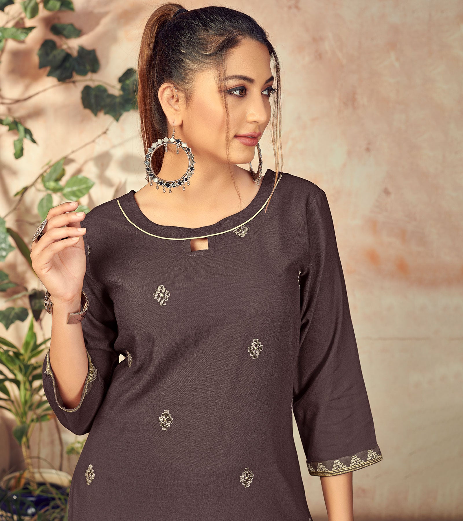 Laxmipati Rayon Charcoal Brown Straight Cut Kurti Has Round Neck Variation , Embroidered Cufe & Different Yoke Pattern
