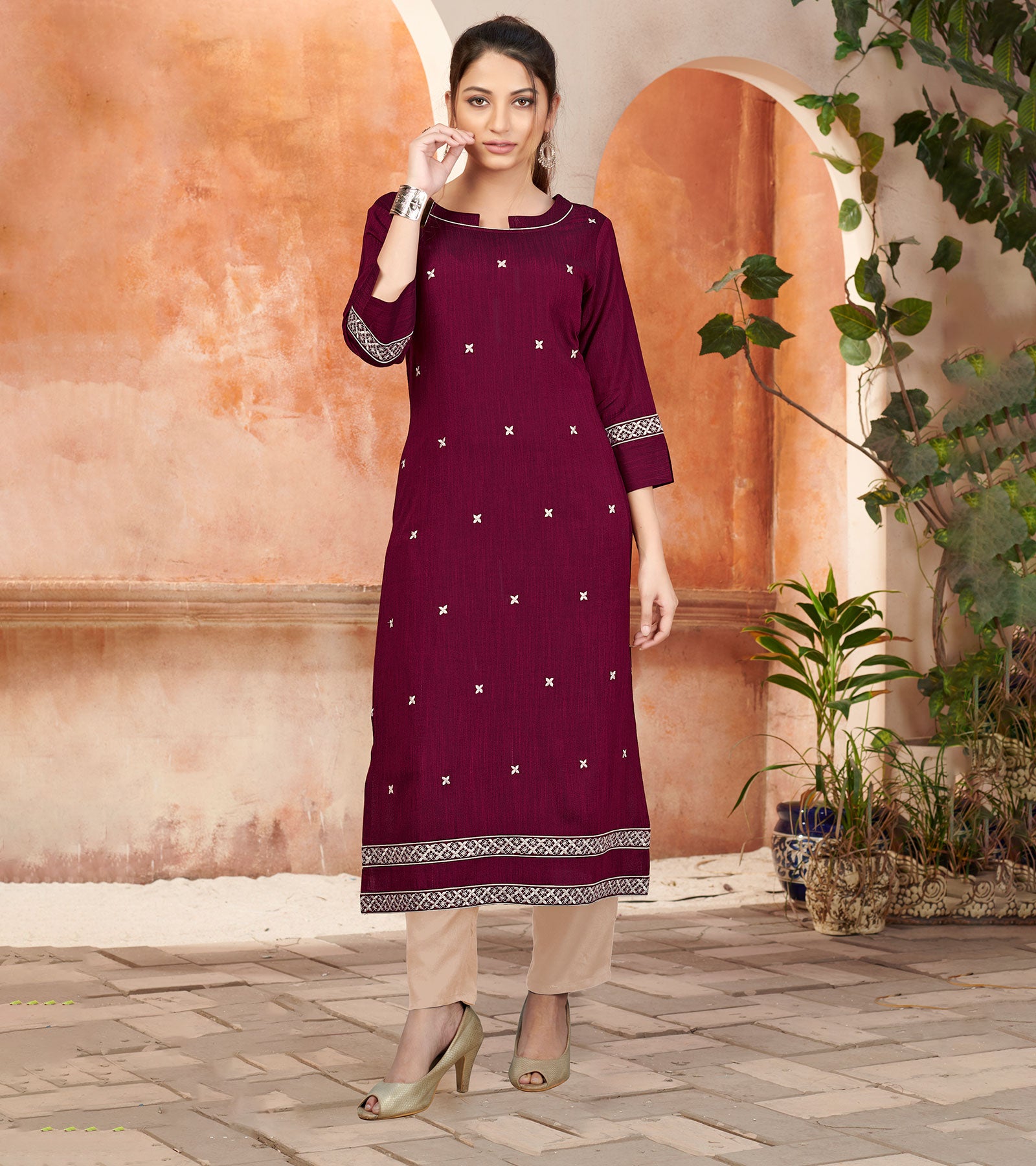 Laxmipati Bombay Velvet Mulberry Maroon Straight Kurti Have Fancy Necklines With All Over Grading Embossed Buttas & Laces Use Of Contrast Colour Effect, Along With Pant