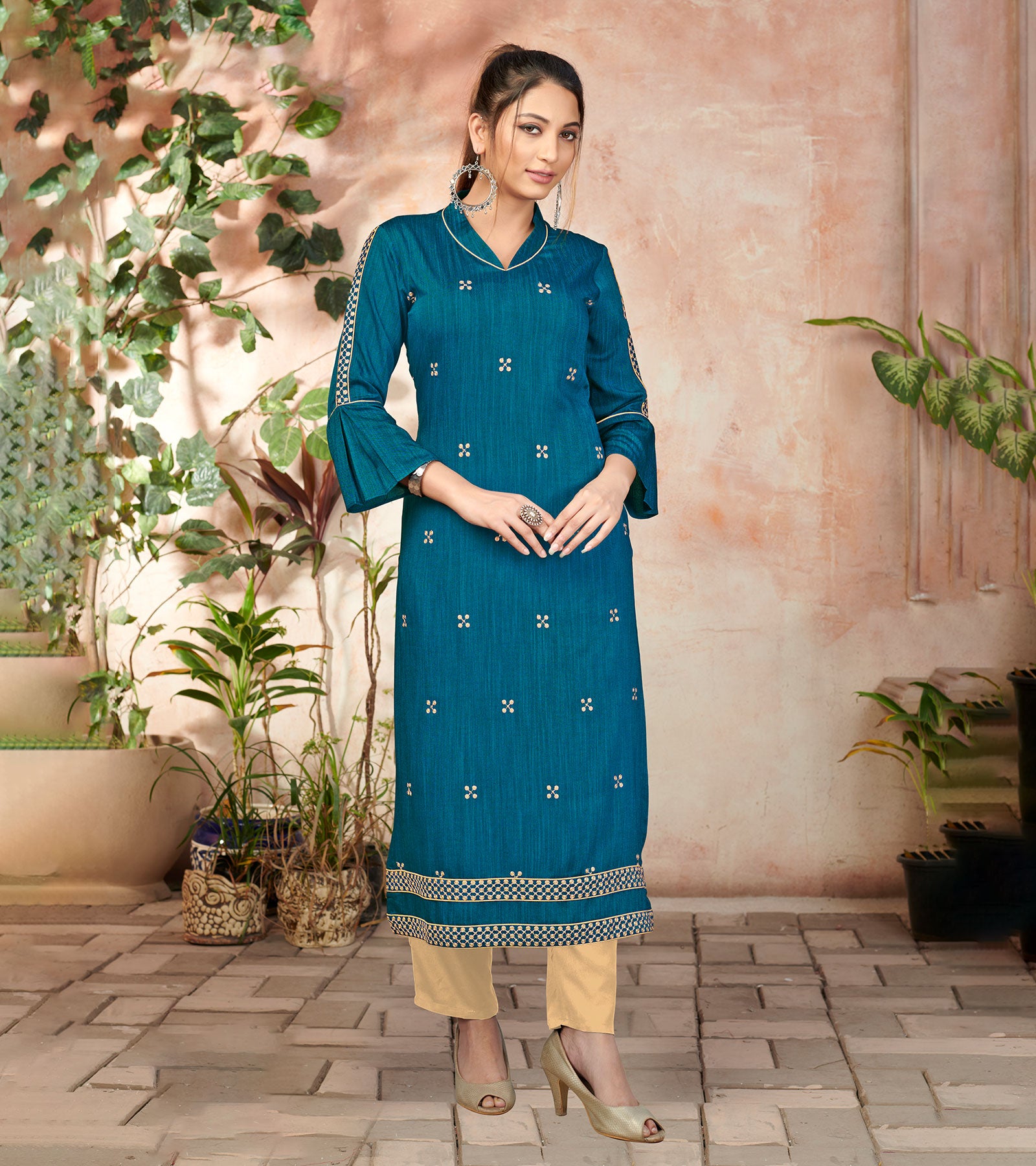 Laxmipati Bombay Velvet Whale Blue Straight Kurti Have Fancy Necklines With All Over Grading Embossed Buttas & Laces Use Of Contrast Colour Effect, Along With Pant