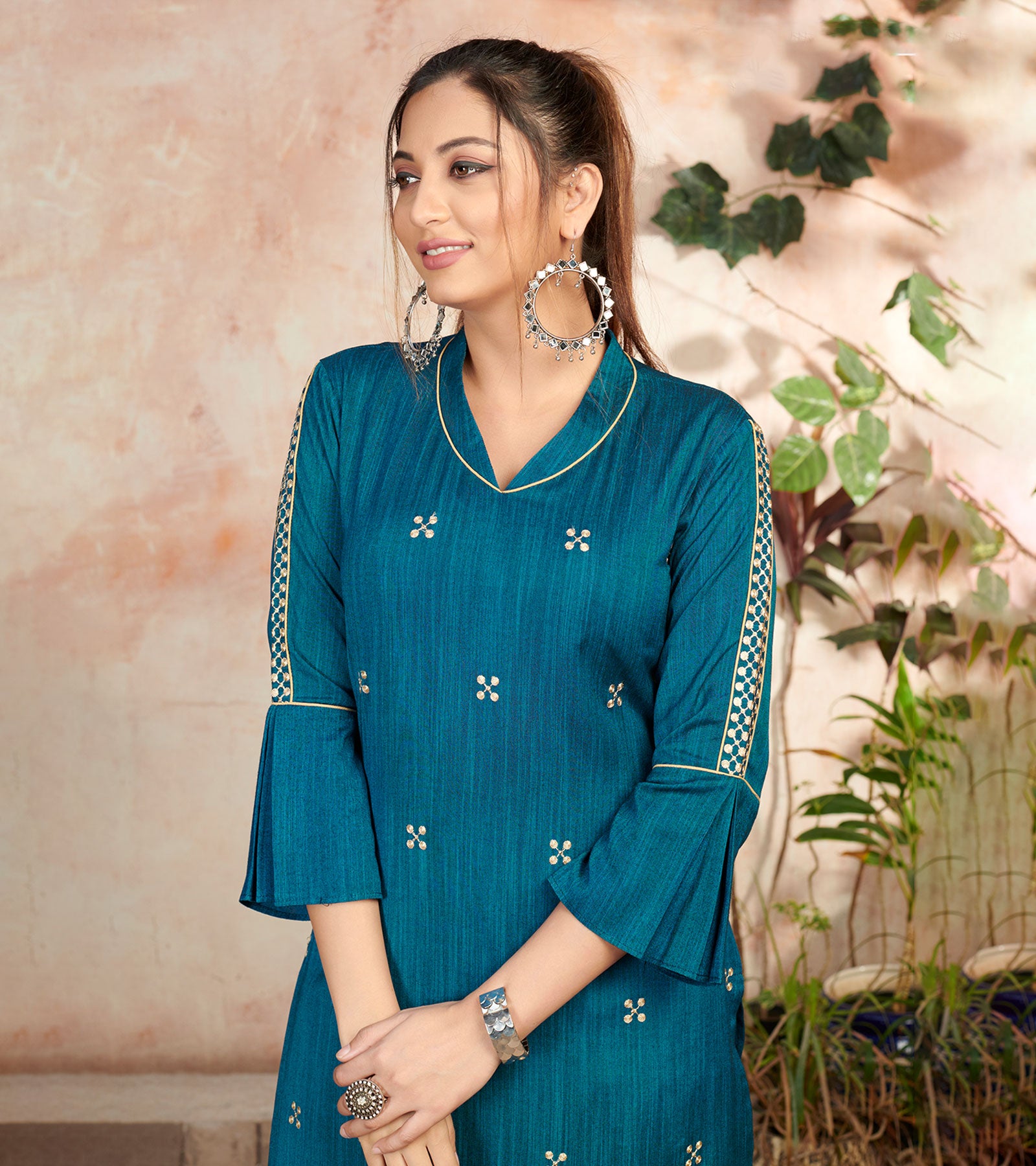 Laxmipati Bombay Velvet Whale Blue Straight Kurti Have Fancy Necklines With All Over Grading Embossed Buttas & Laces Use Of Contrast Colour Effect, Along With Pant