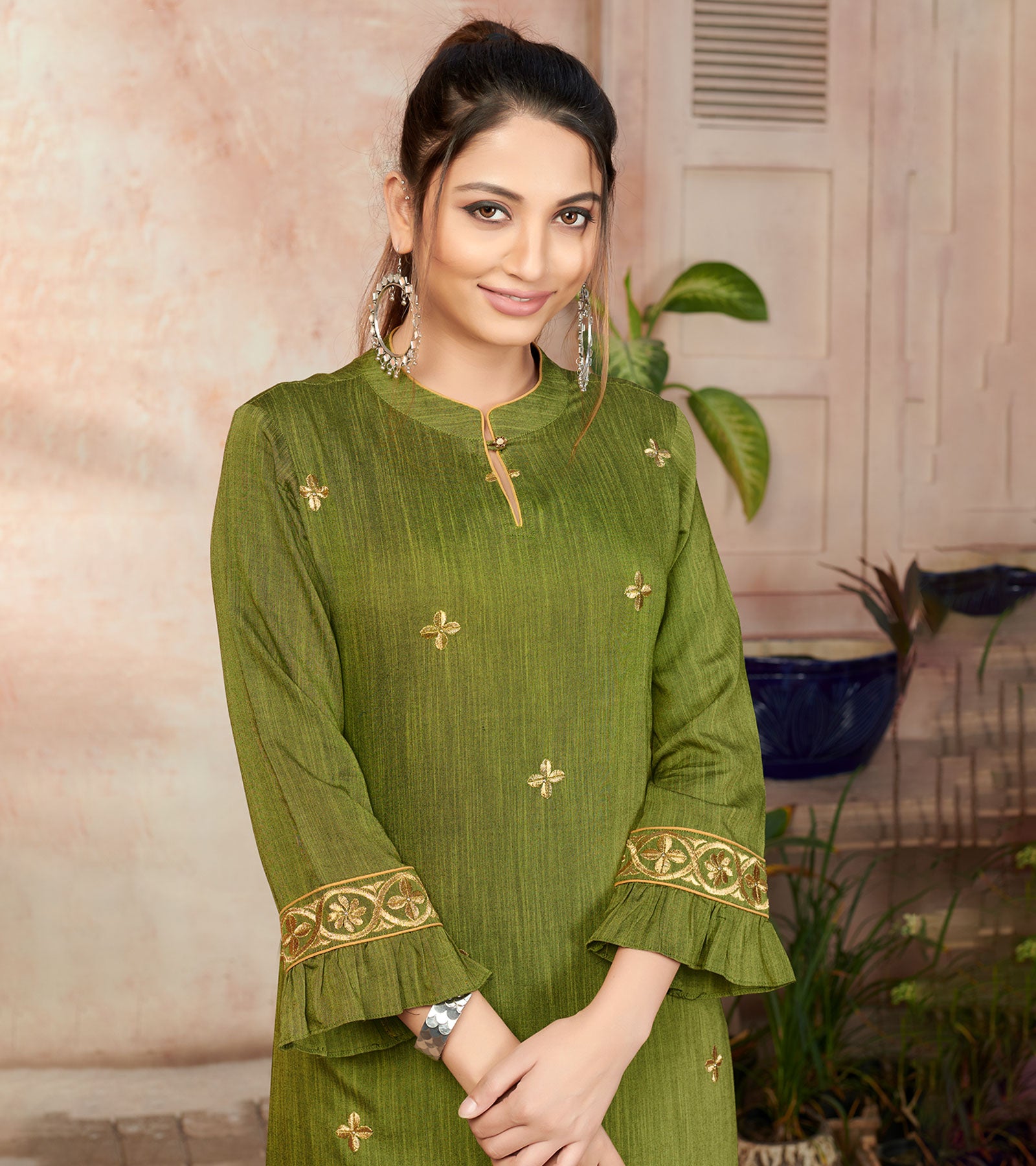 Laxmipati Bombay Velvet Leaf Green Straight Kurti Have Fancy Necklines With All Over Grading Embossed Buttas & Laces Use Of Contrast Colour Effect, Along With Pant