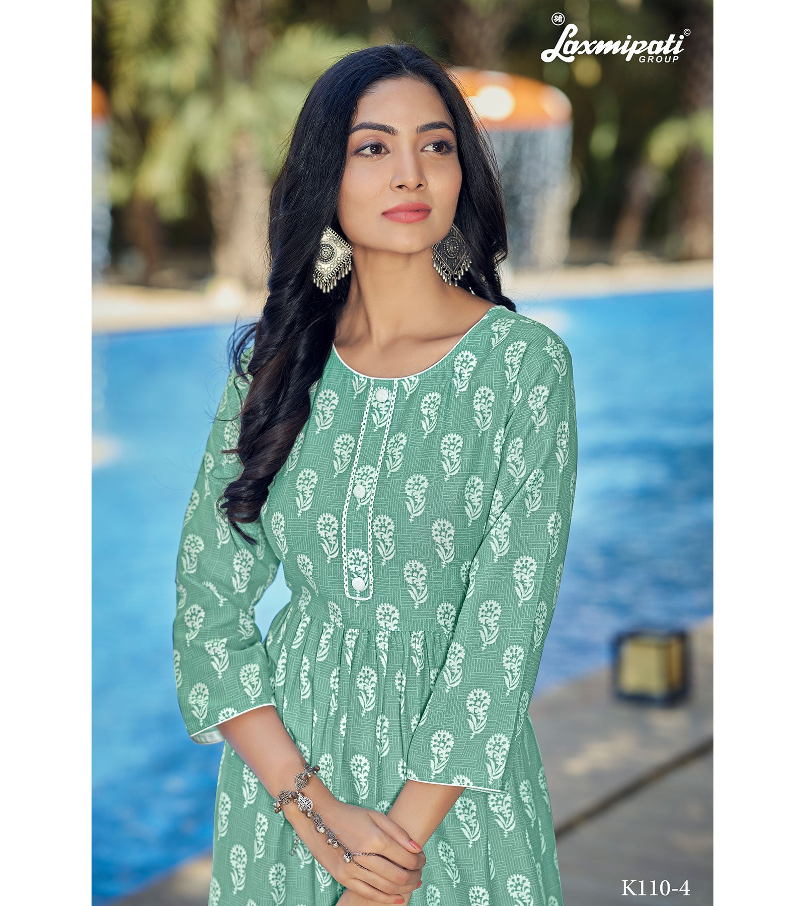 Laxmipati Spun Base Fabric Turquoise Green Light Nayra Cut Kurti With Pant