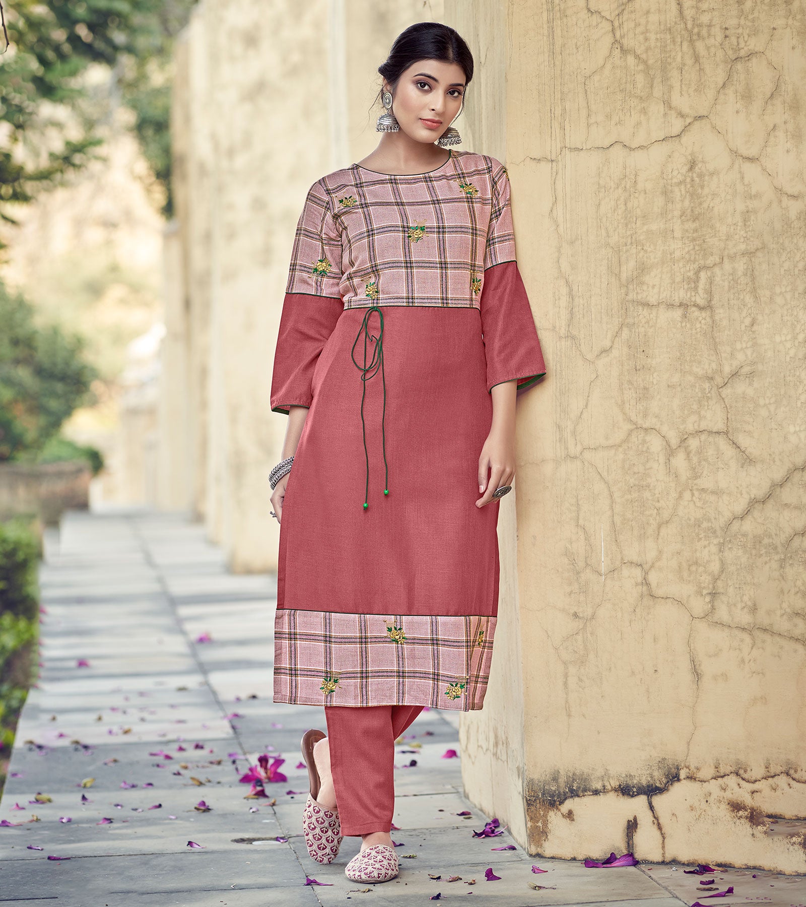 Laxmipati Rayon Cross And Swiss Slub Crimson Red And Checks Kurti With Two Fabrics By Giving All Over Grading Butta With Different Princess Lines , Fancy Yoke , Classy Necklines And Sleeve With Comfy Cuff.
