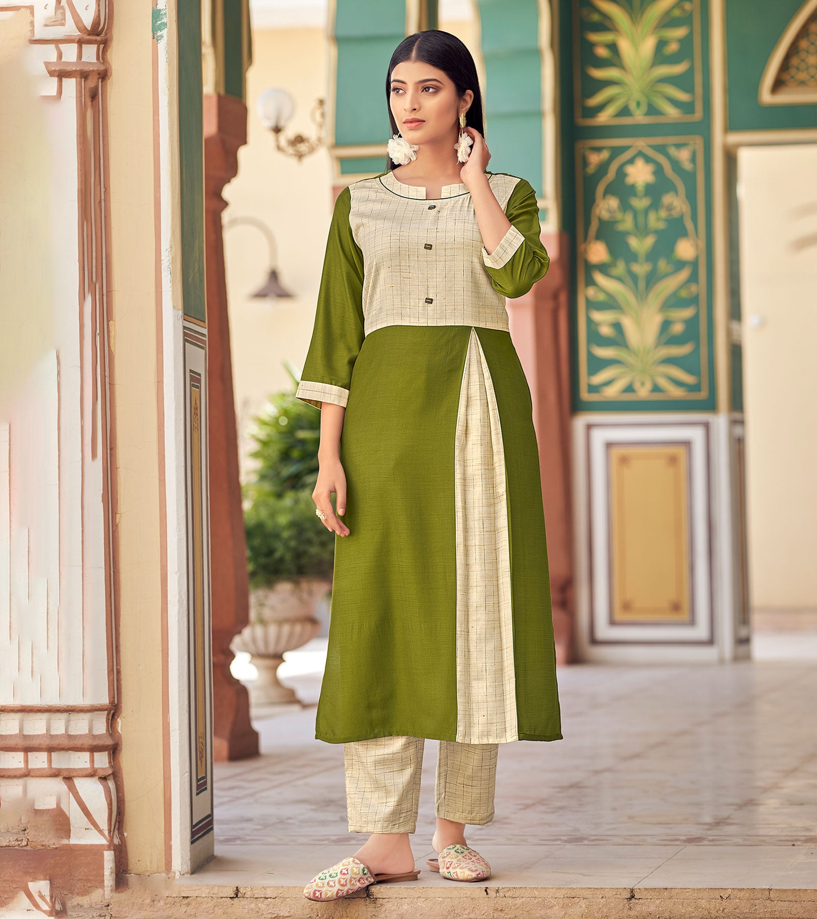 Laxmipati Bsy & Banjara Mose Green Kurti With Two Fabrics By Giving Different Princess Lines , Fancy Yoke , Classy Necklines And Sleeve With Comfy Cuff.
