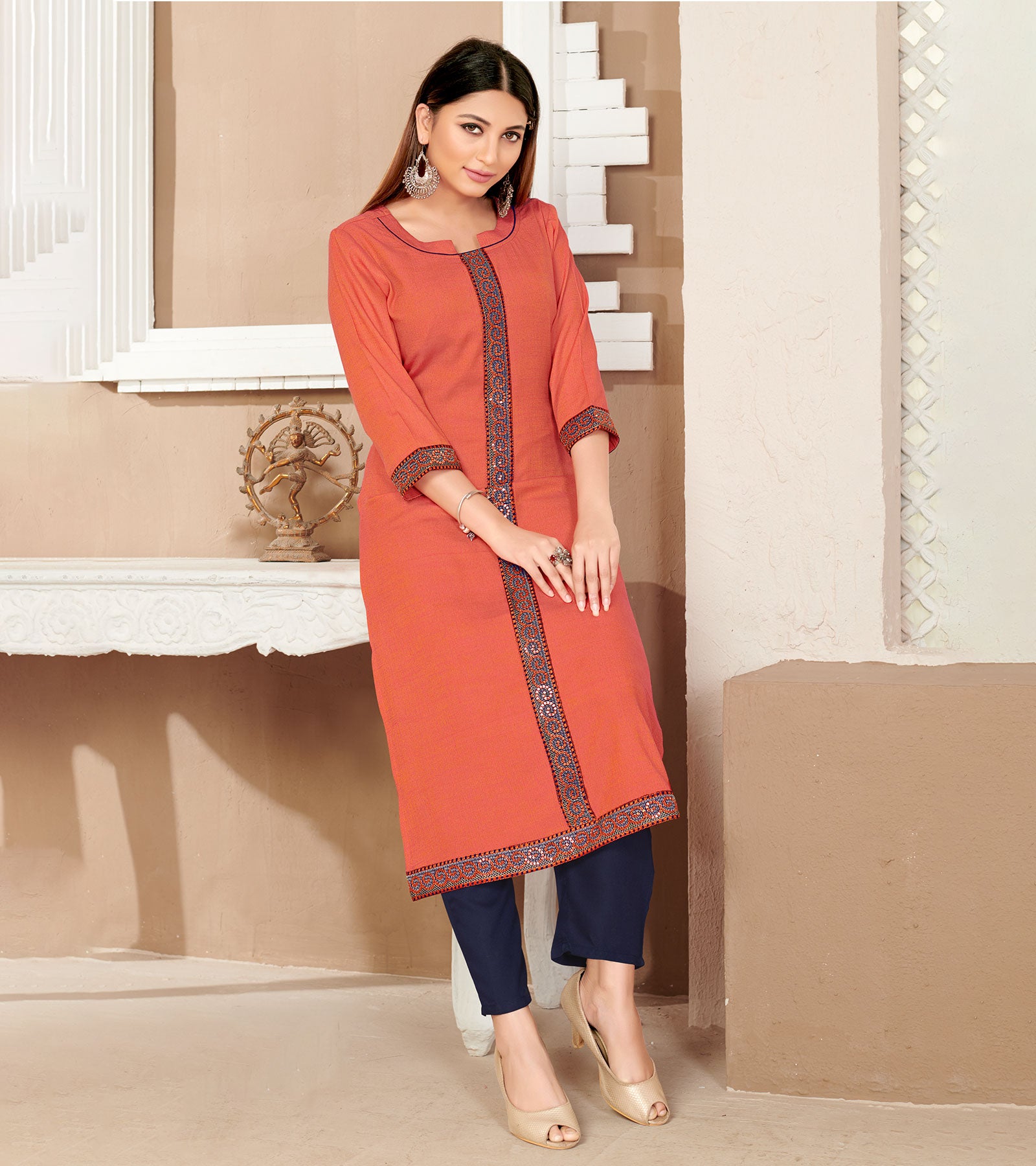Laxmipati Rayon Cross Narangi Beautifully Placed Embroidered Boarder Straightfit Kurti With Evergreen Necklines, Enhancing With Stylish Button .