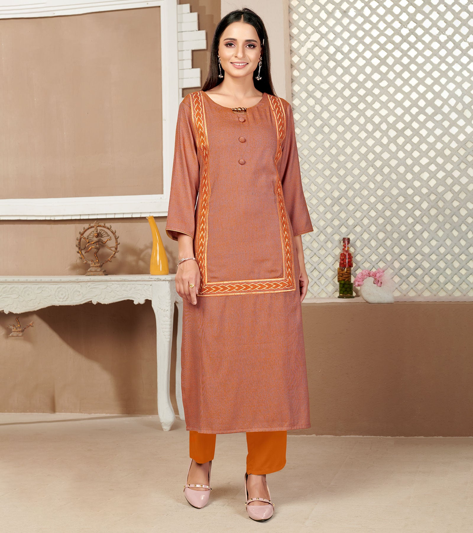 Laxmipati Rayon Cross Yam Orange Beautifully Placed Embroidered Boarder Straightfit Kurti With Evergreen Necklines, Enhancing With Stylish Button .