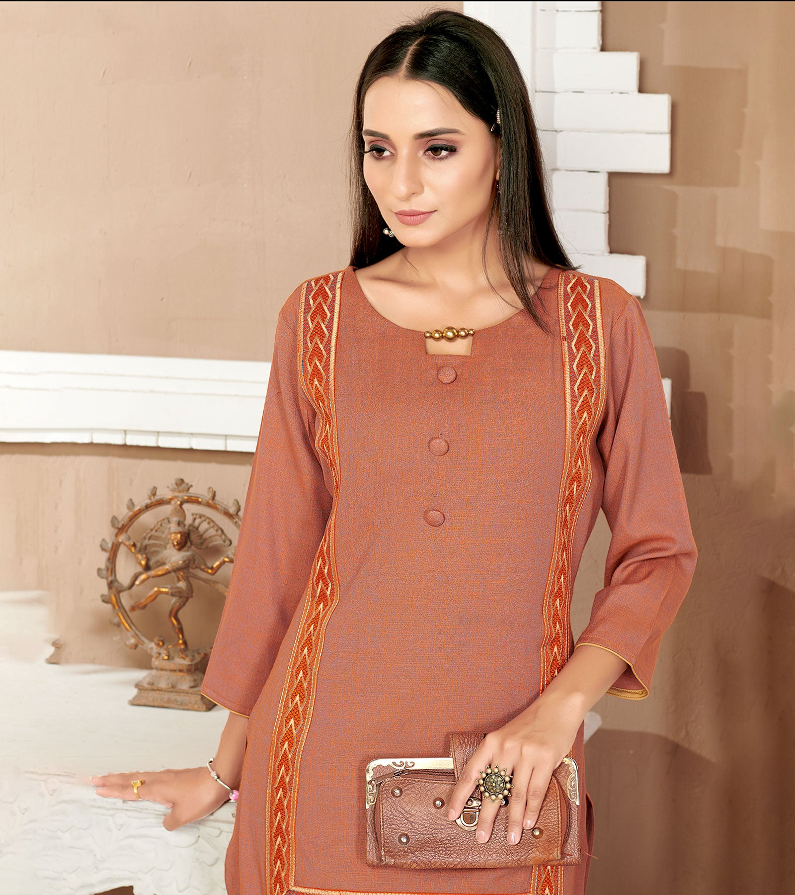 Laxmipati Rayon Cross Yam Orange Beautifully Placed Embroidered Boarder Straightfit Kurti With Evergreen Necklines, Enhancing With Stylish Button .