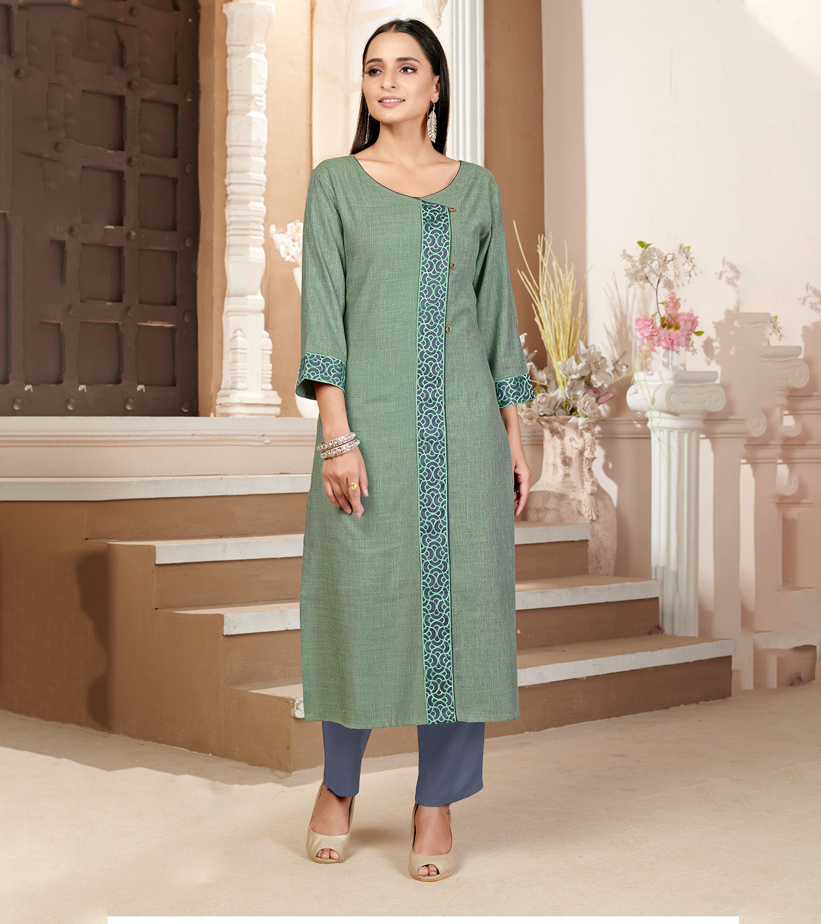 Laxmipati Rayon Cross Salem Green Beautifully Placed Embroidered Boarder Straightfit Kurti With Evergreen Necklines, Enhancing With Stylish Button .