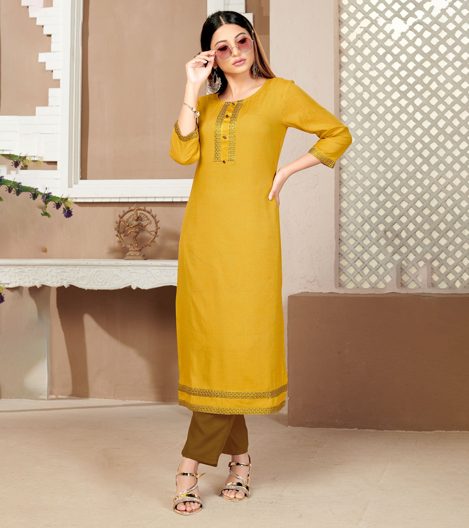 Laxmipati Rayon Cross Yellow Beautifully Placed Embroidered Boarder Straightfit Kurti With Evergreen Necklines, Enhancing With Stylish Button .