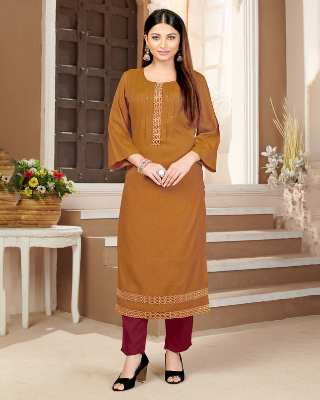 Laxmipati Rayon Cross Caramel Beautifully Placed Embroidered Boarder Straightfit Kurti With Evergreen Necklines, Enhancing With Stylish Button .