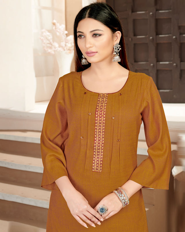 Laxmipati Rayon Cross Caramel Beautifully Placed Embroidered Boarder Straightfit Kurti With Evergreen Necklines, Enhancing With Stylish Button .