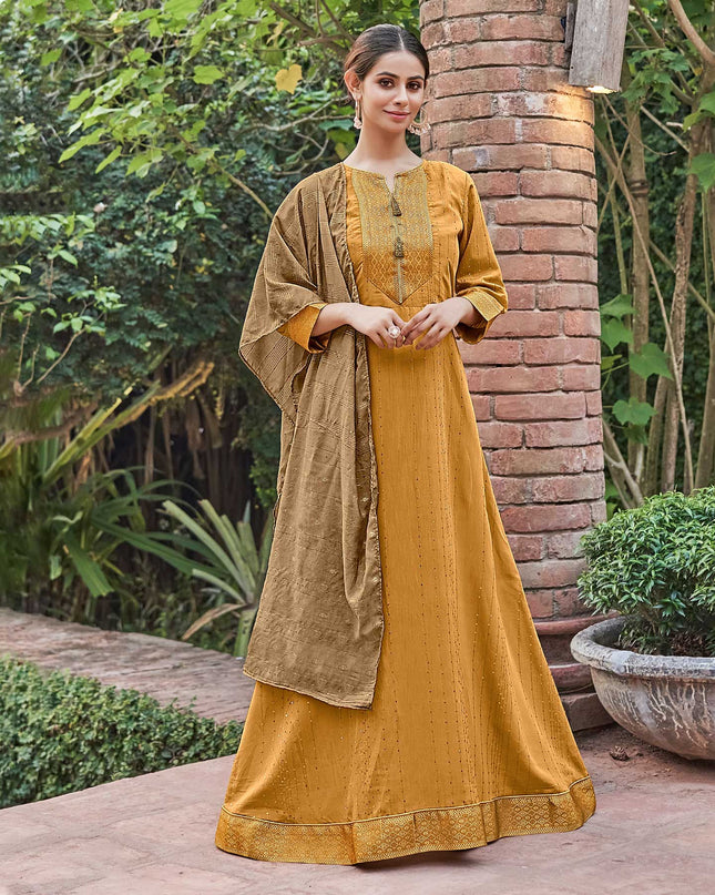 Laxmipati Muslin Majestique Musturd Flaired Length Gown With Dupatta