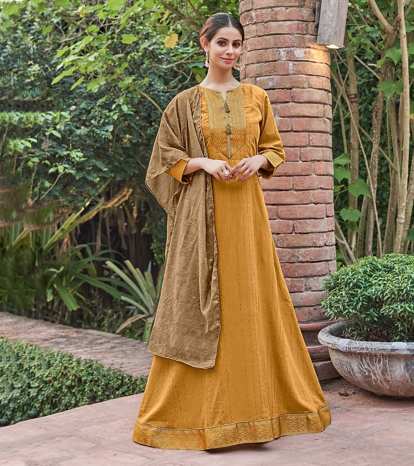 Laxmipati Muslin Majestique Musturd Flaired Length Gown With Dupatta