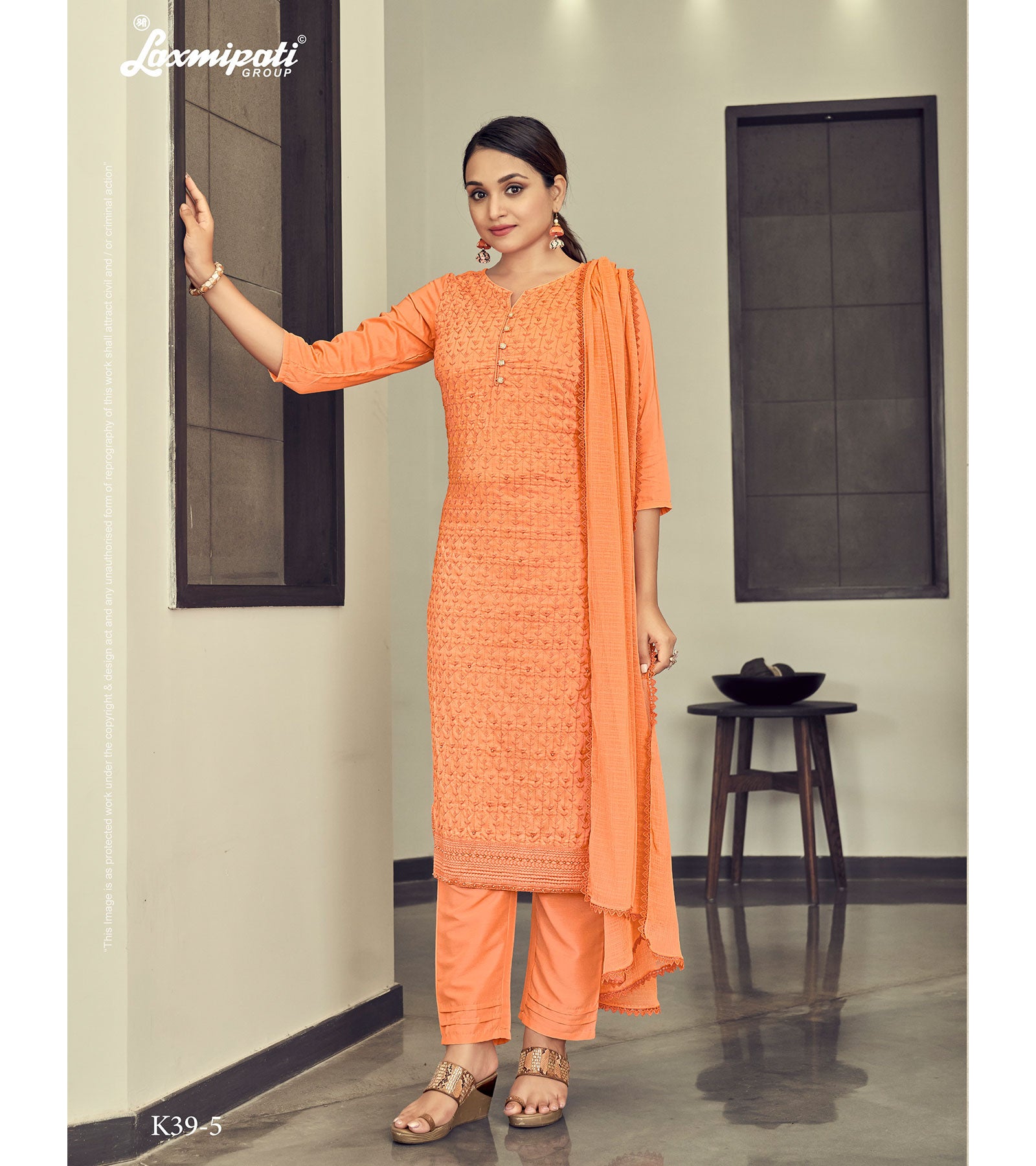 Laxmipati Vriteka Muslin Salmon Straight Cut Kurti With Pant & Dupatta