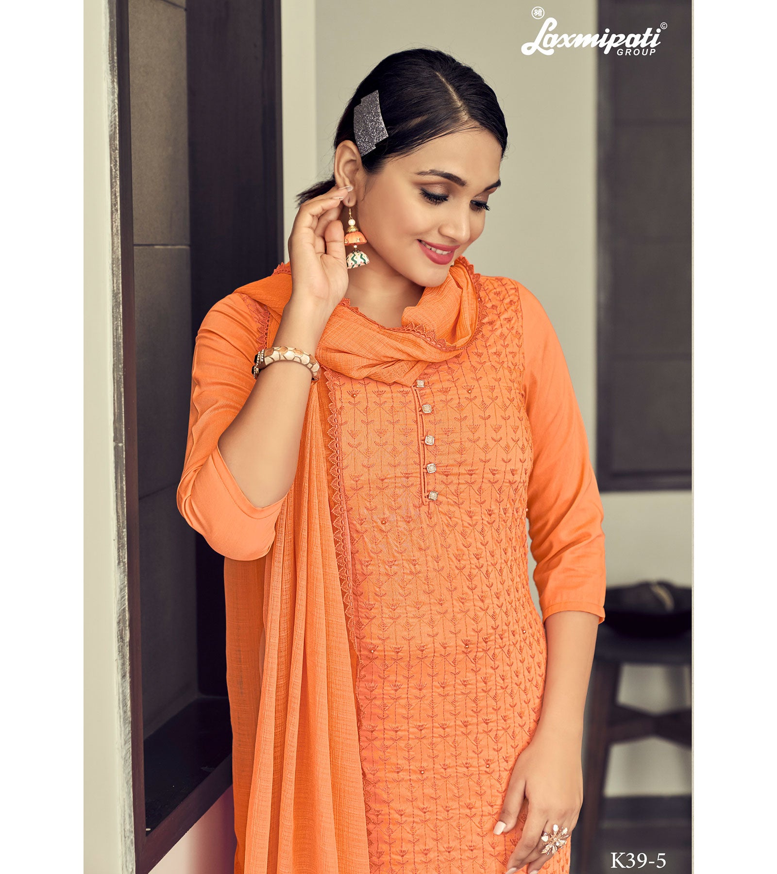 Laxmipati Vriteka Muslin Salmon Straight Cut Kurti With Pant & Dupatta