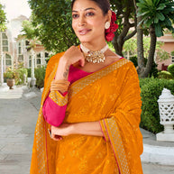 Laxmipati Falooda Floral Embroidered along with Stone Work Chiffon Saree in Orange Color with Unstitched Blouse