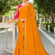 Laxmipati Falooda Floral Embroidered along with Stone Work Chiffon Saree in Orange Color with Unstitched Blouse