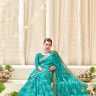 Sky Blue Chiffon Saree with Wavy Print with Floral Embroidery - Aleena