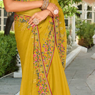 Laxmipati Falooda Floral Embroidered along with Stone Work Chiffon Saree in Ochre Yellow Color with Unstitched Blouse