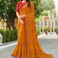 Laxmipati Falooda Floral Embroidered along with Zari and Stone Work Chiffon Saree in Orange Color with Unstitched Blouse