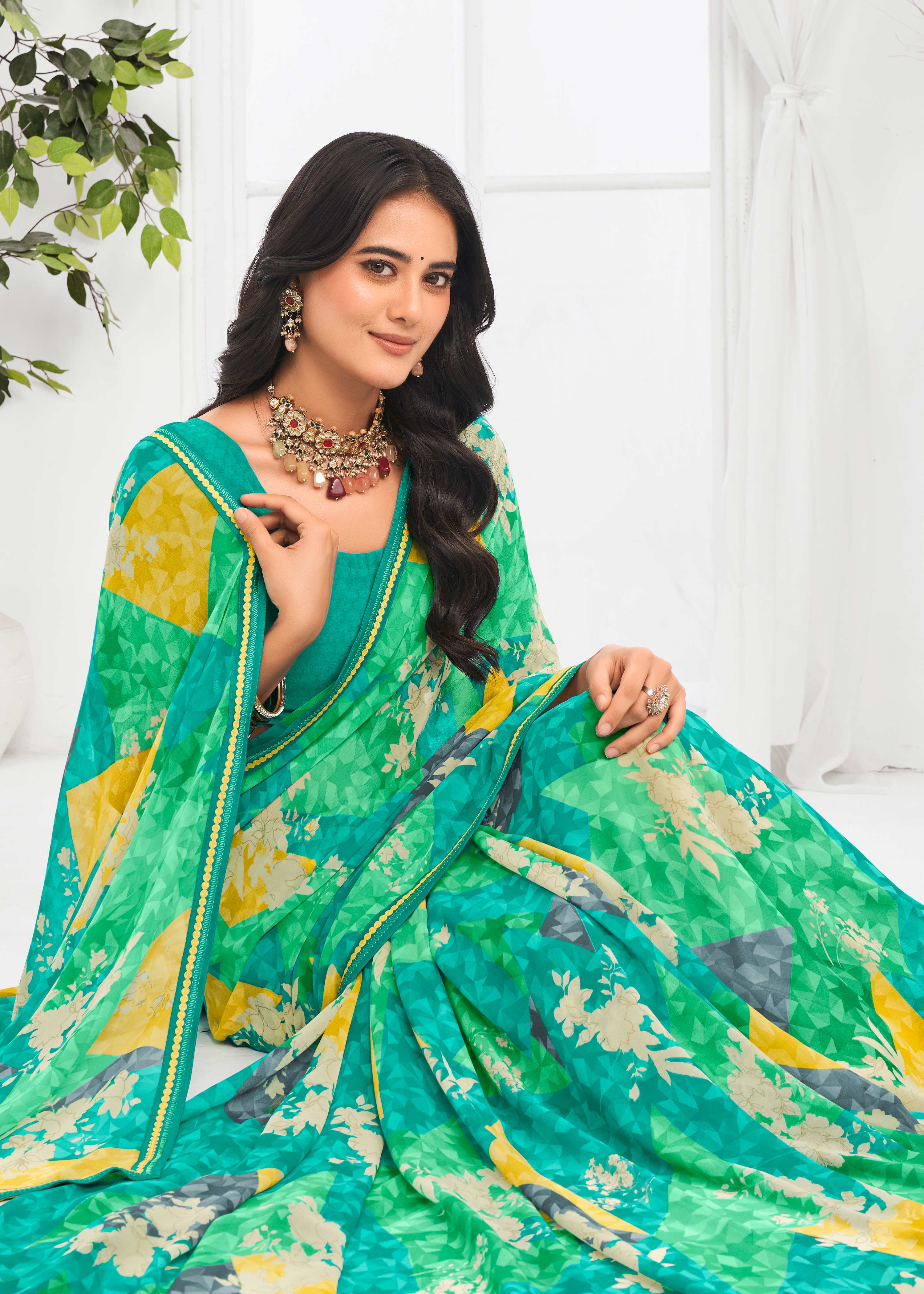 Laxmipati Jaayaphal Teal Green Floral Georgette Printed Saree