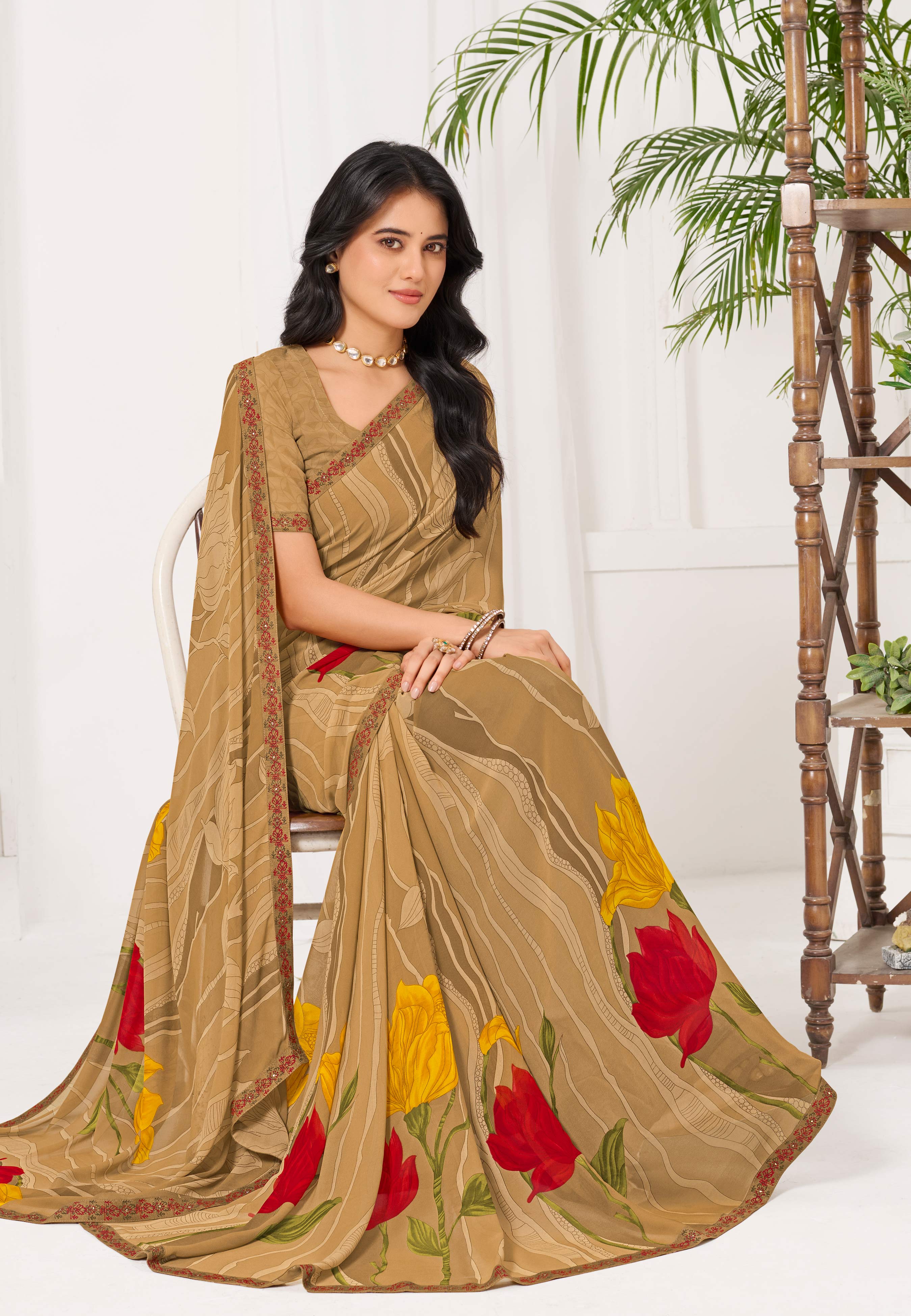 Laxmipati Radha Rani Floral Georgette Printed Saree in Brown Color